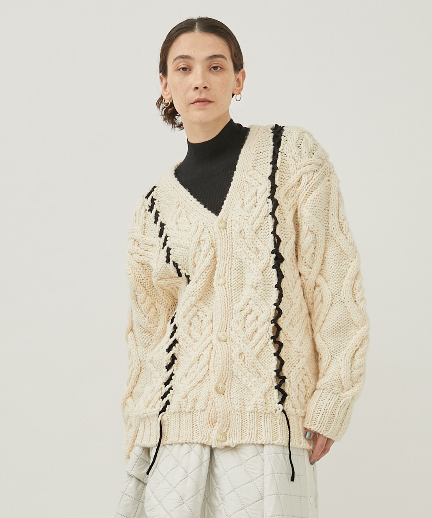 Deformtion Cable Knit Cardigan