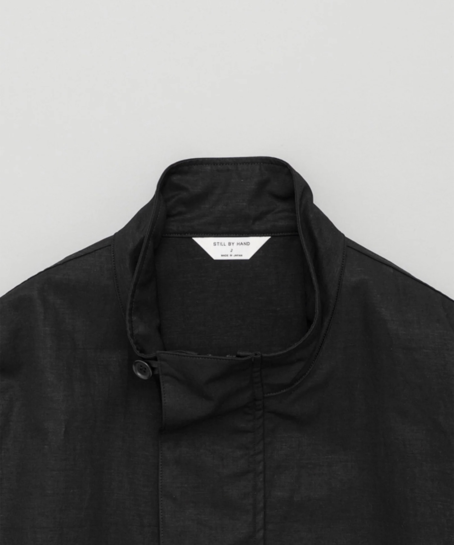 Stand collar blouson STILL BY HAND