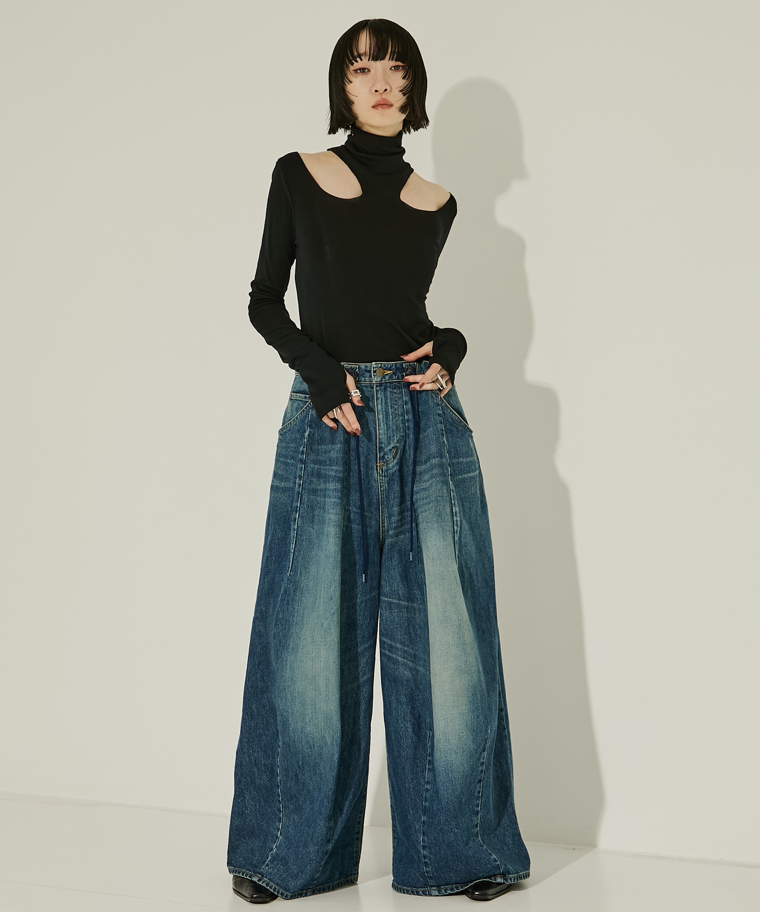 WOOL RIB HOLLOWED OUT TURTLE NECK TOP JOHN LAWRENCE SULLIVAN