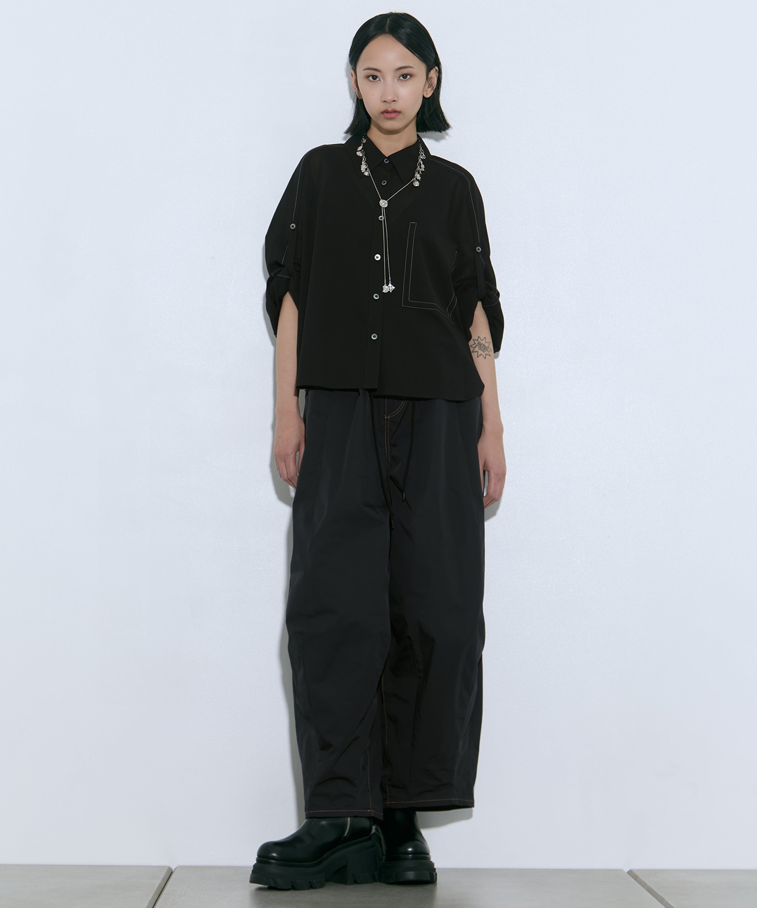 Metal motif loop tie TOGA
