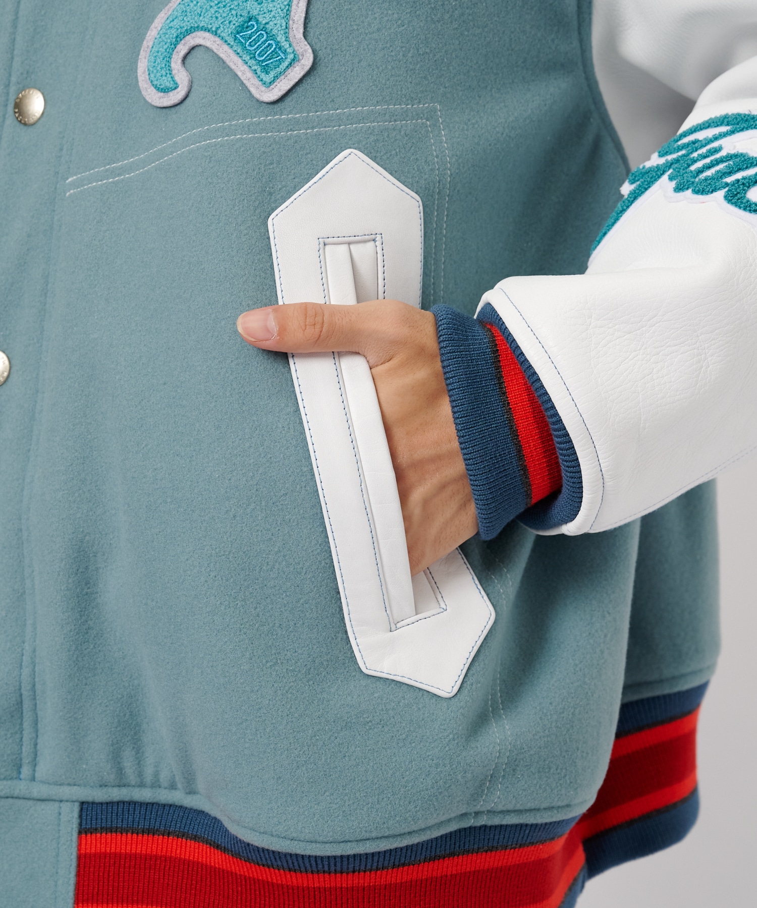 PATCHED STADIUM JACKET FACETASM