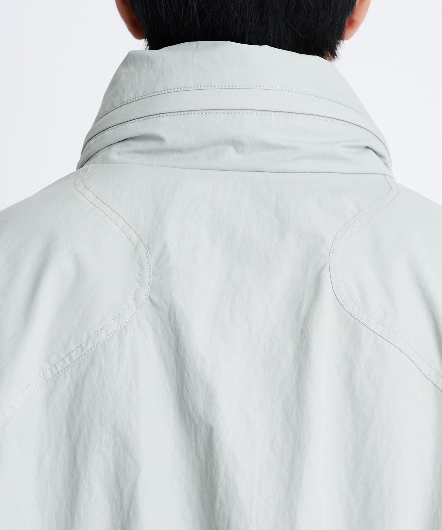 別注>CURVED ZIP FRONT NYLON JACKET｜NVRFRGT