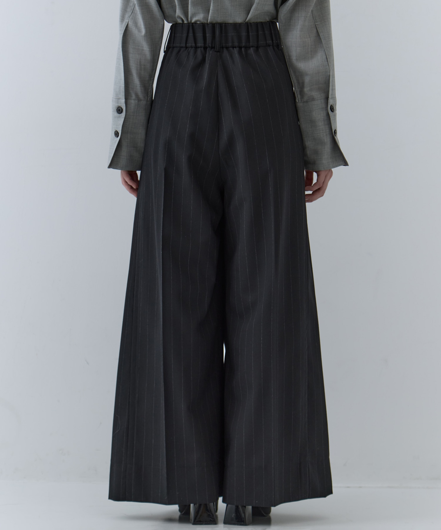 Asymmetric Tucked Flare Trousers STUDIOUS