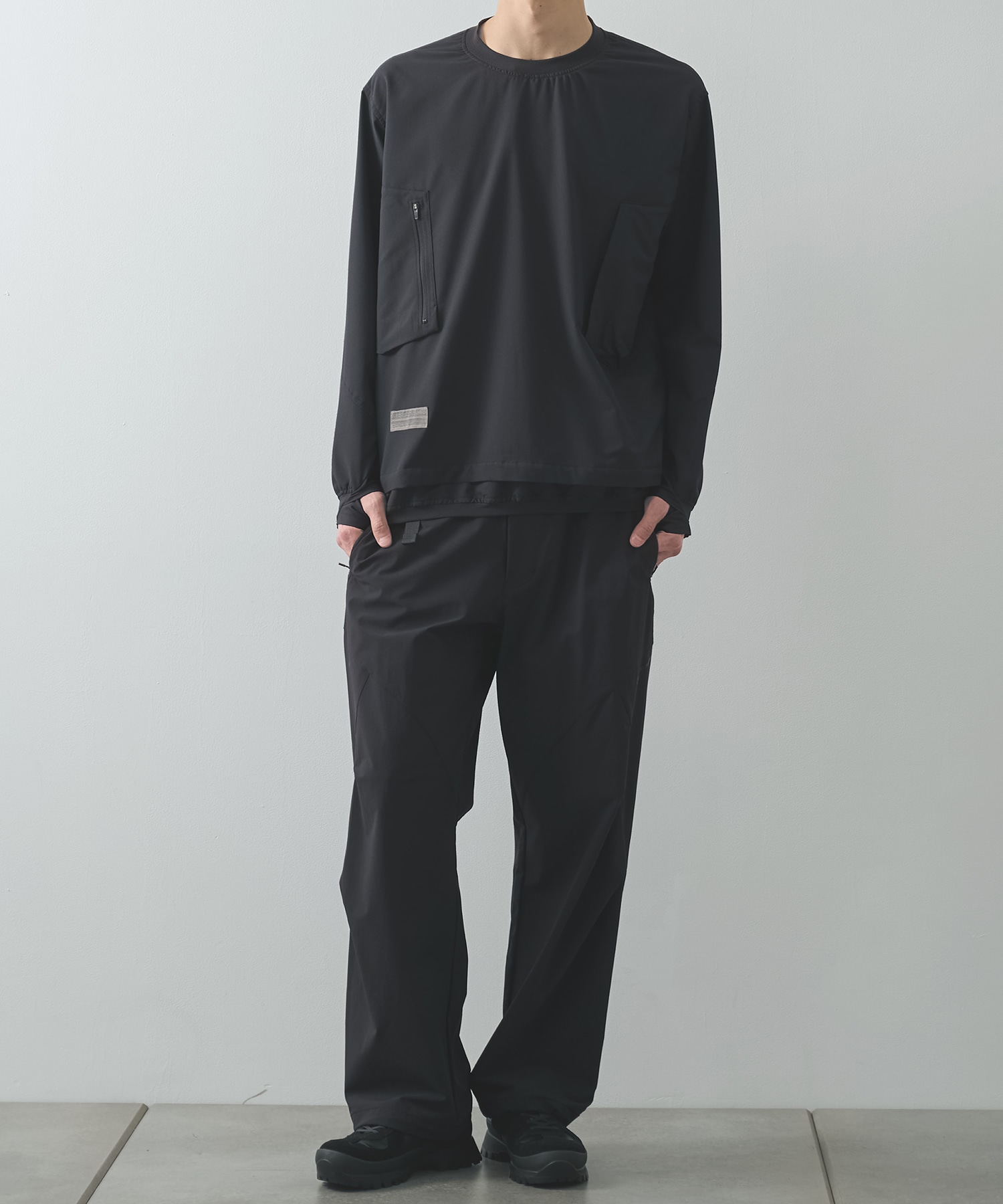 THE DEFORMED L/S PULLOVER WITH UTILITY POCKETS POLIQUANT