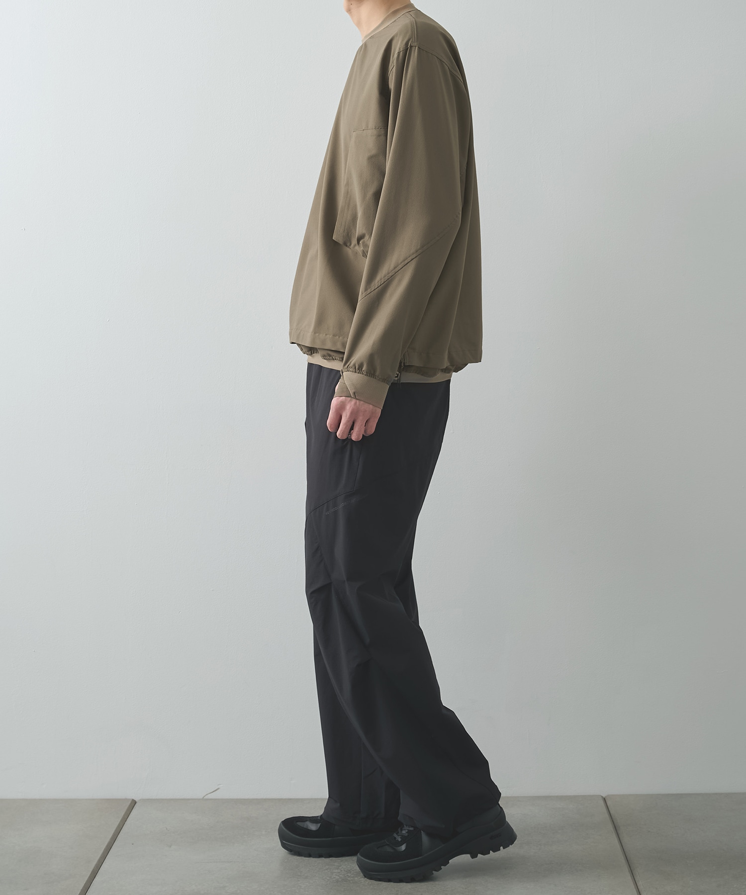 THE DEFORMED L/S PULLOVER WITH UTILITY POCKETS POLIQUANT