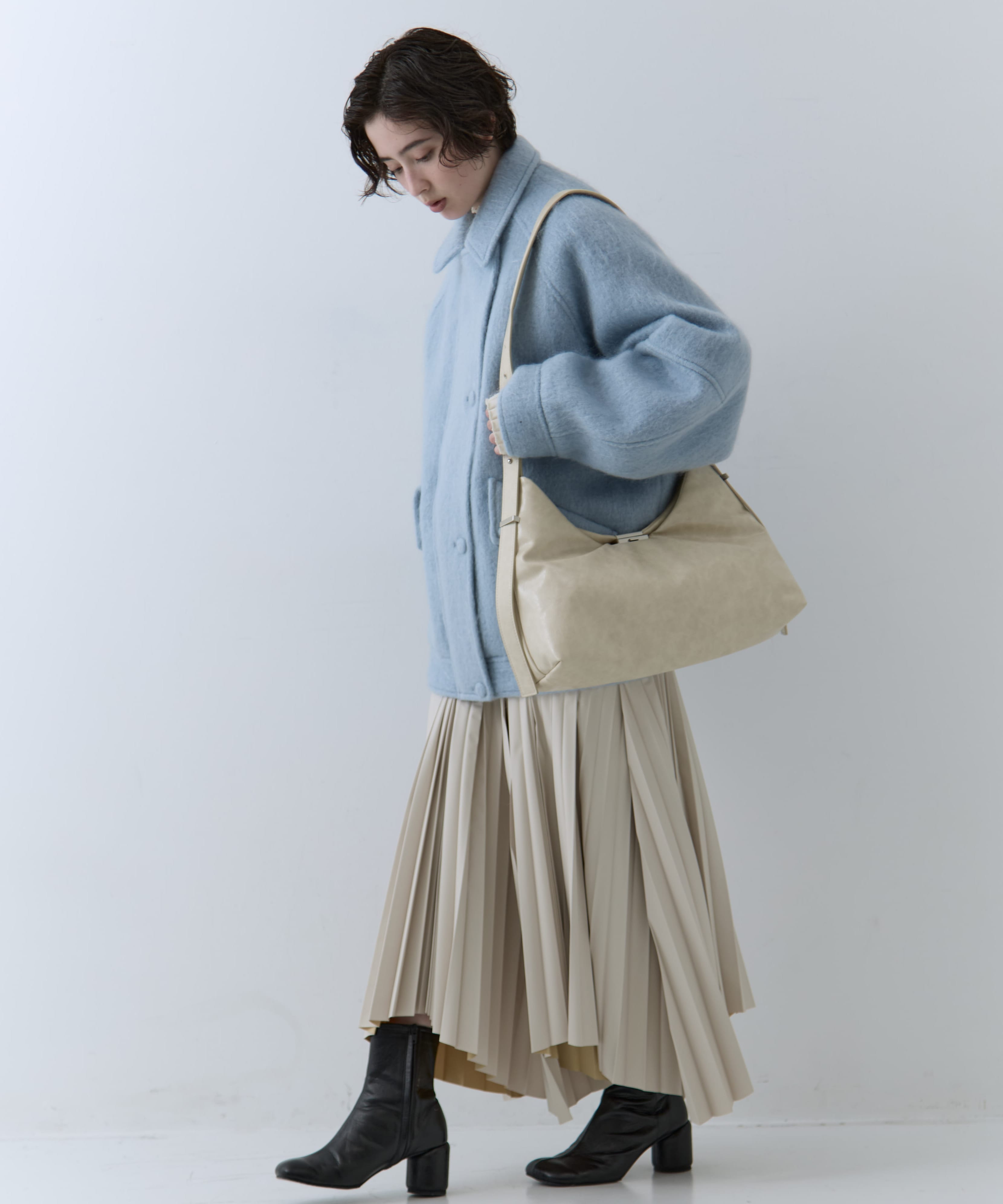 UND PARTS ACCENT ONE HANDLE BAG AMERI