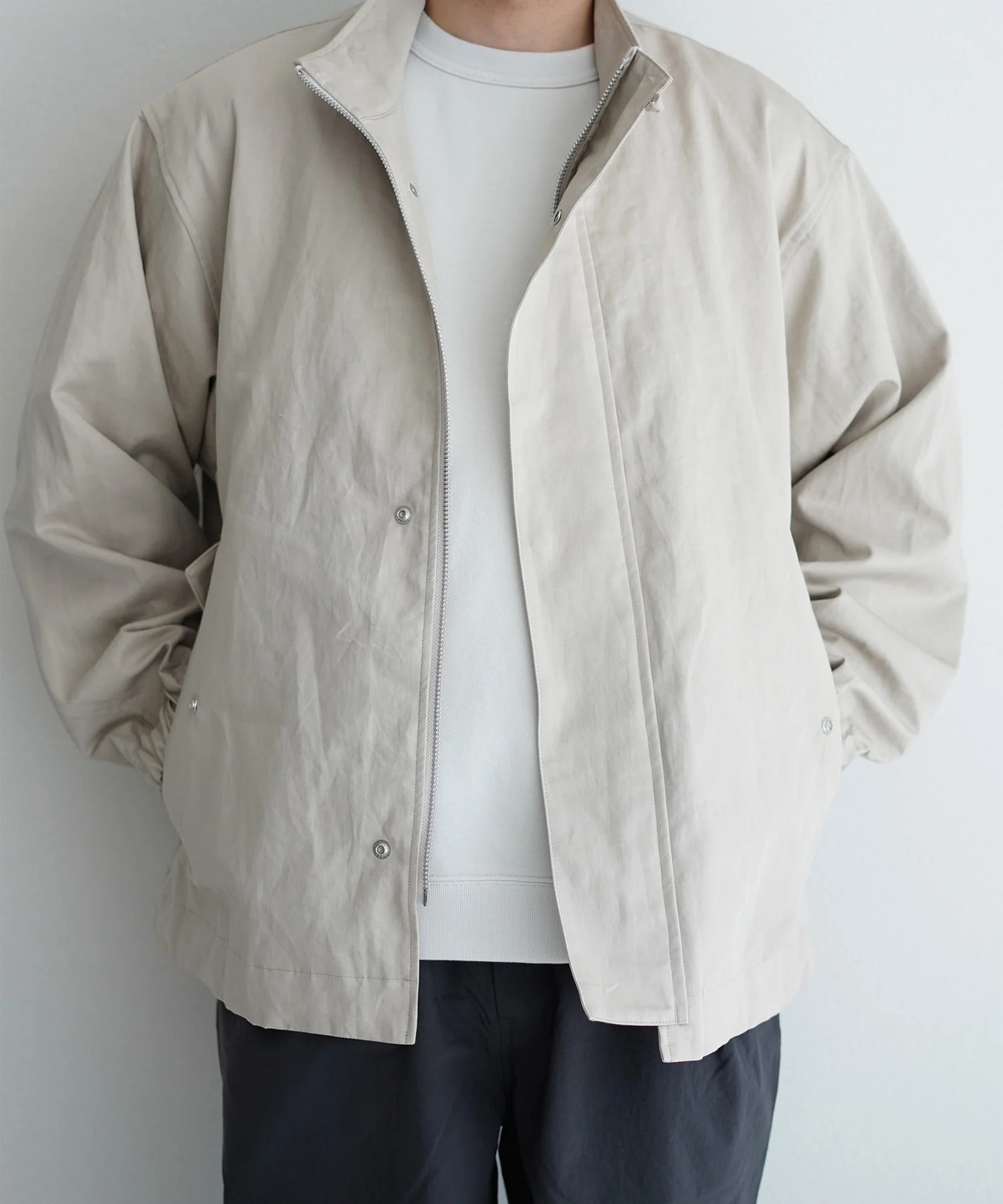 Stand collar blouson STILL BY HAND