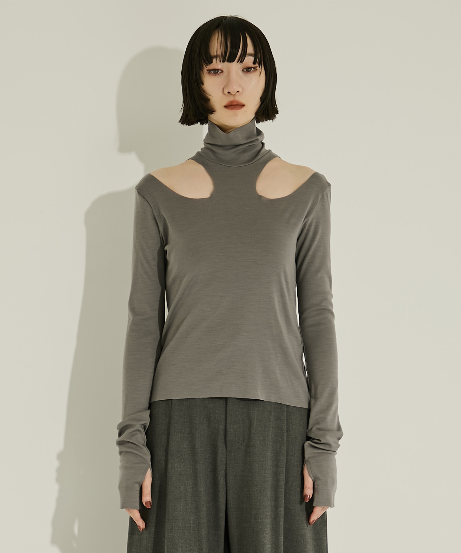 WOOL RIB HOLLOWED OUT TURTLE NECK TOP JOHN LAWRENCE SULLIVAN