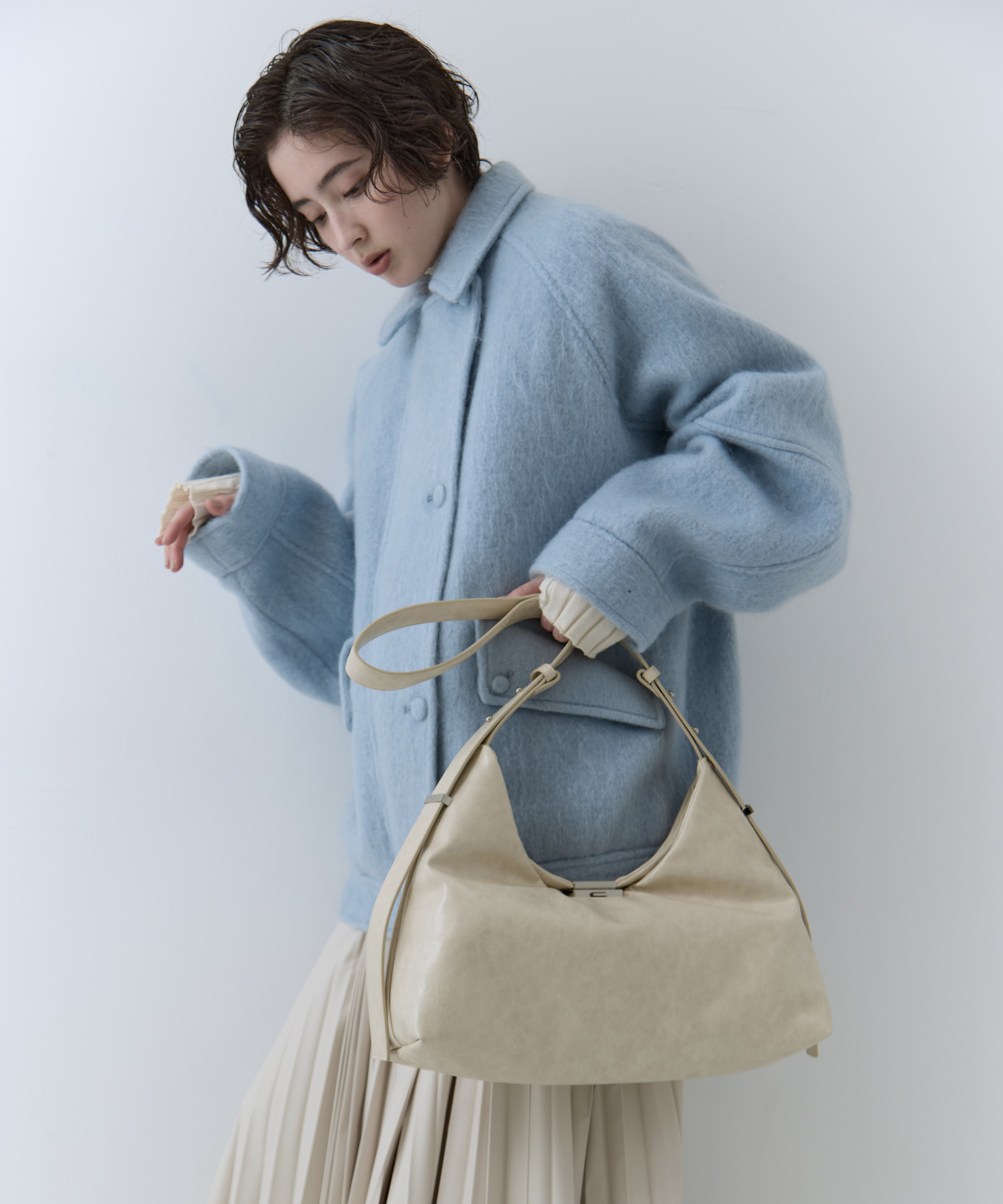 UND PARTS ACCENT ONE HANDLE BAG AMERI