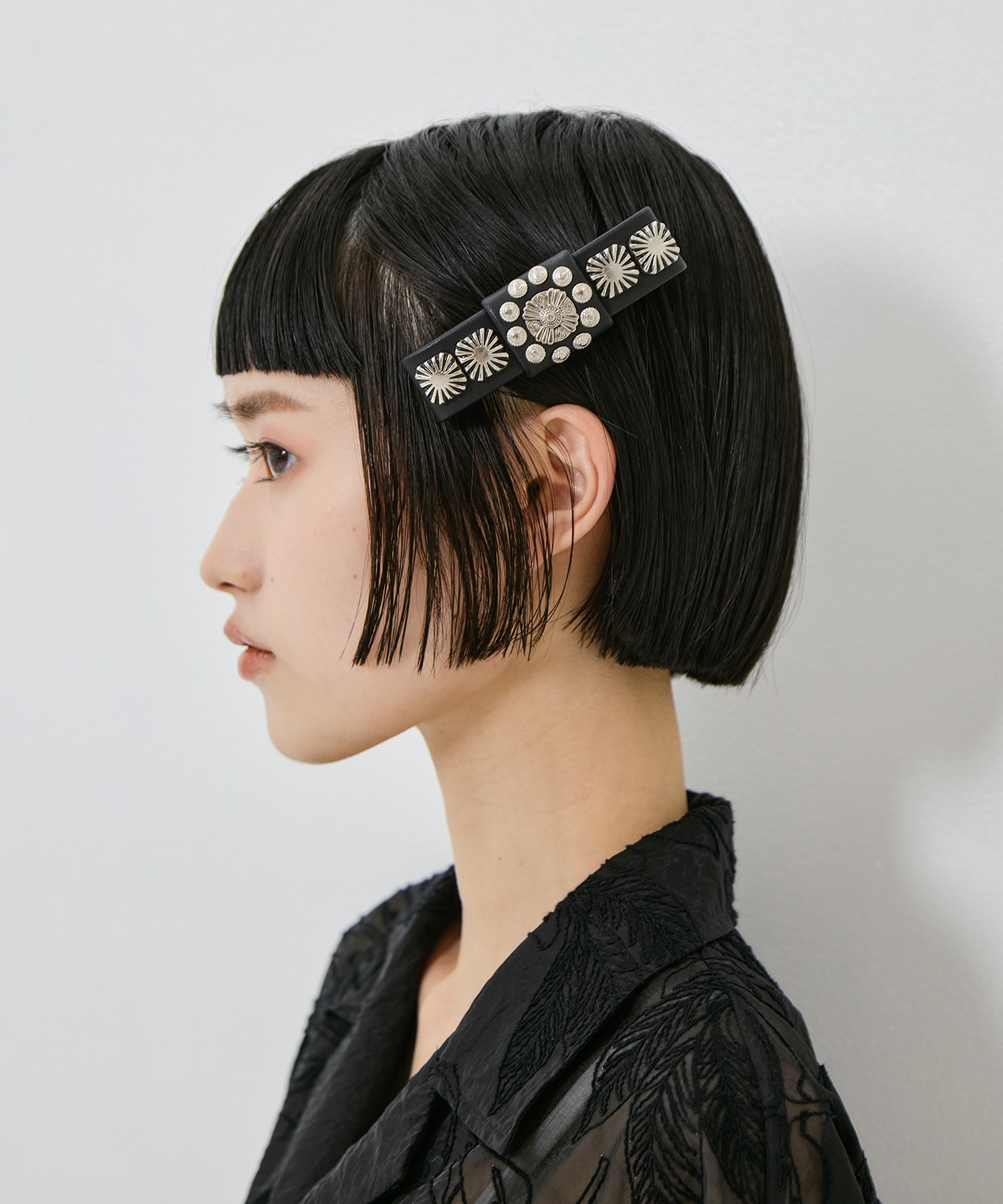 Concho leather barrette TOGA