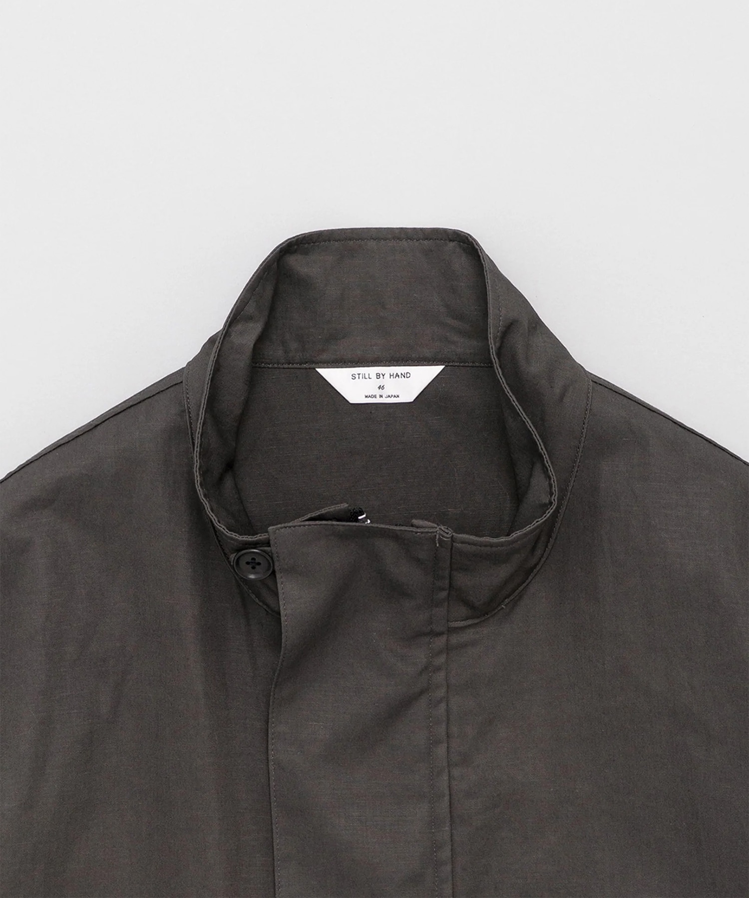 Stand collar blouson STILL BY HAND