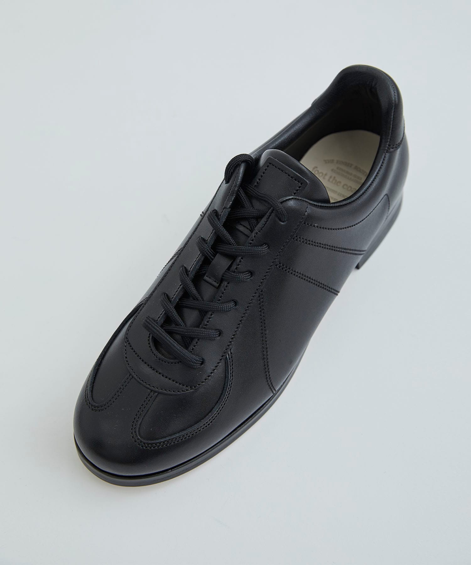 NON-SPORTY SNEAKERS(GERMAN) foot the coacher