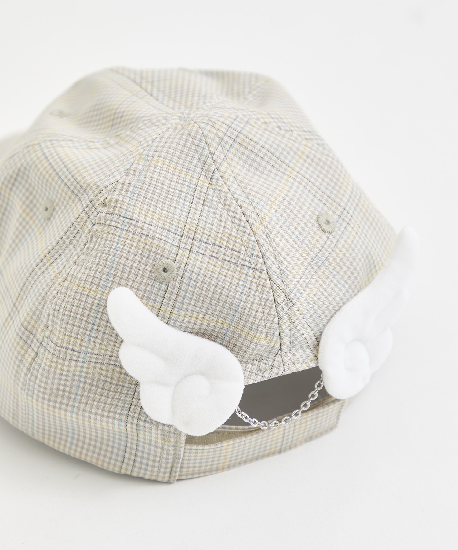 Cartoon angel wing check cap tanakadaisuke