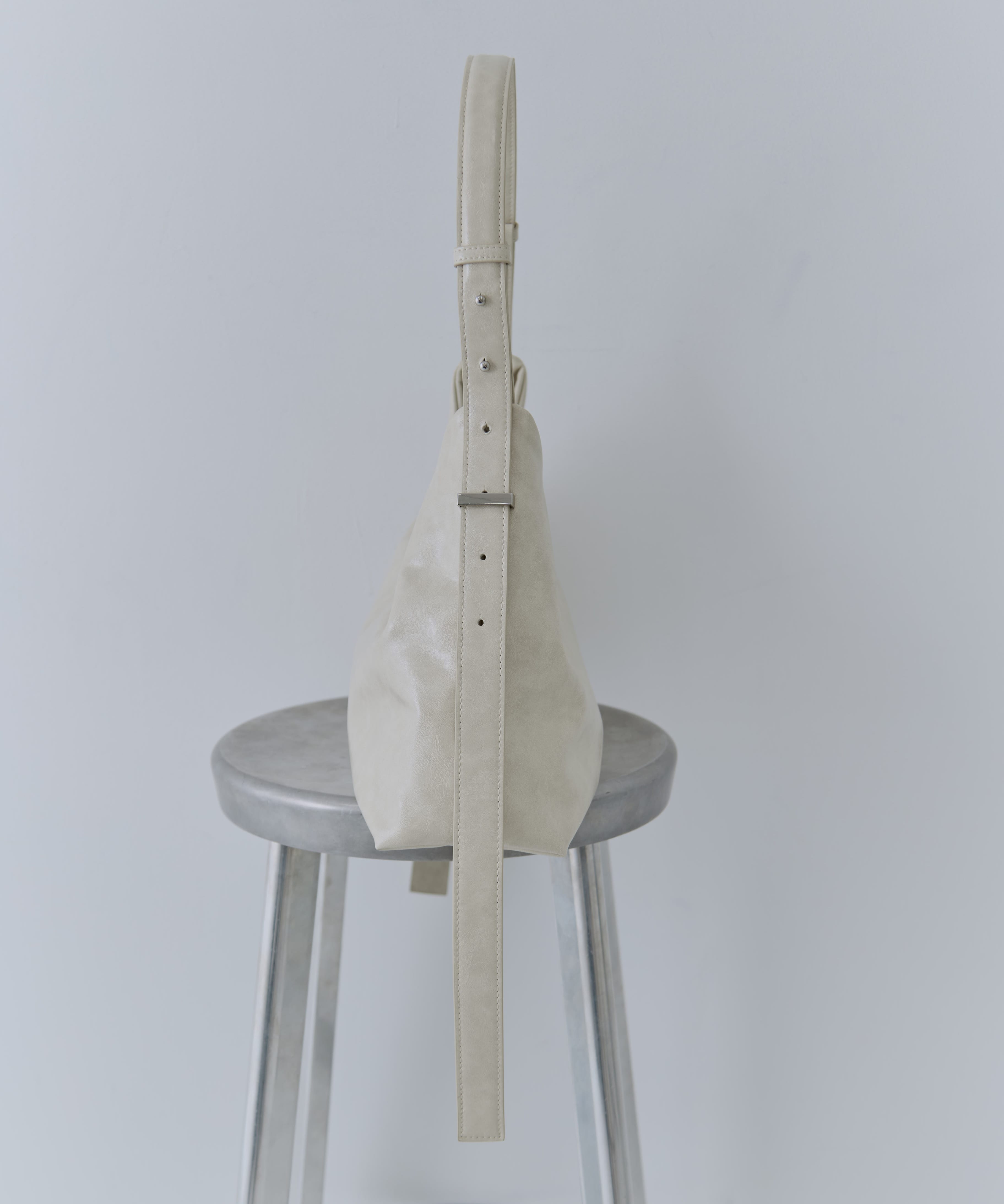 UND PARTS ACCENT ONE HANDLE BAG AMERI