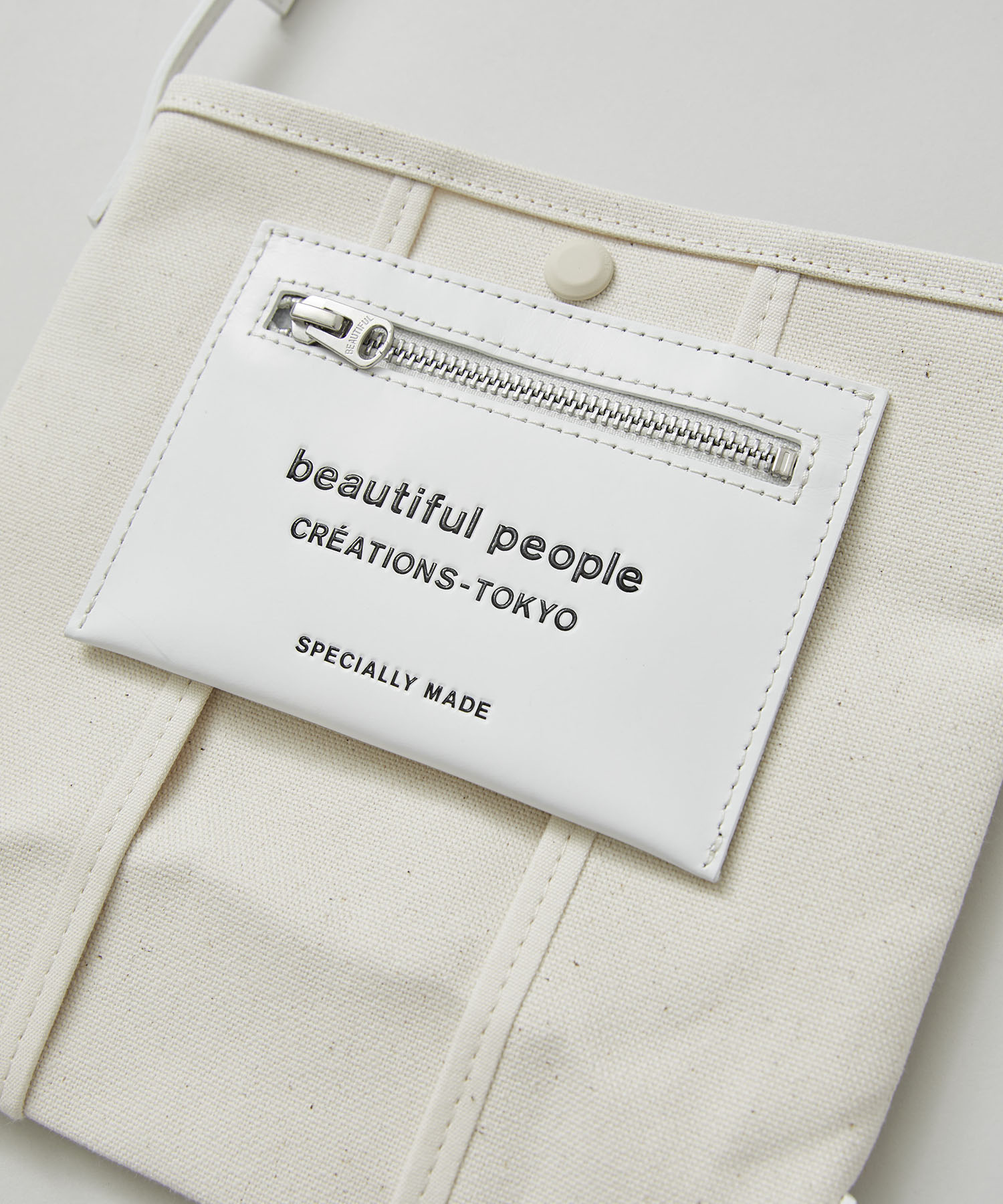 lining logo pocket mini shoulder bag(FREE ECRU): beautiful people