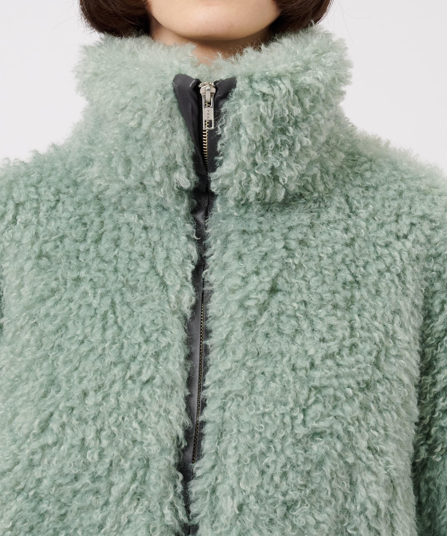 CRIMPED FUR CROPPED BLOUSON THINGS THAT MATTER