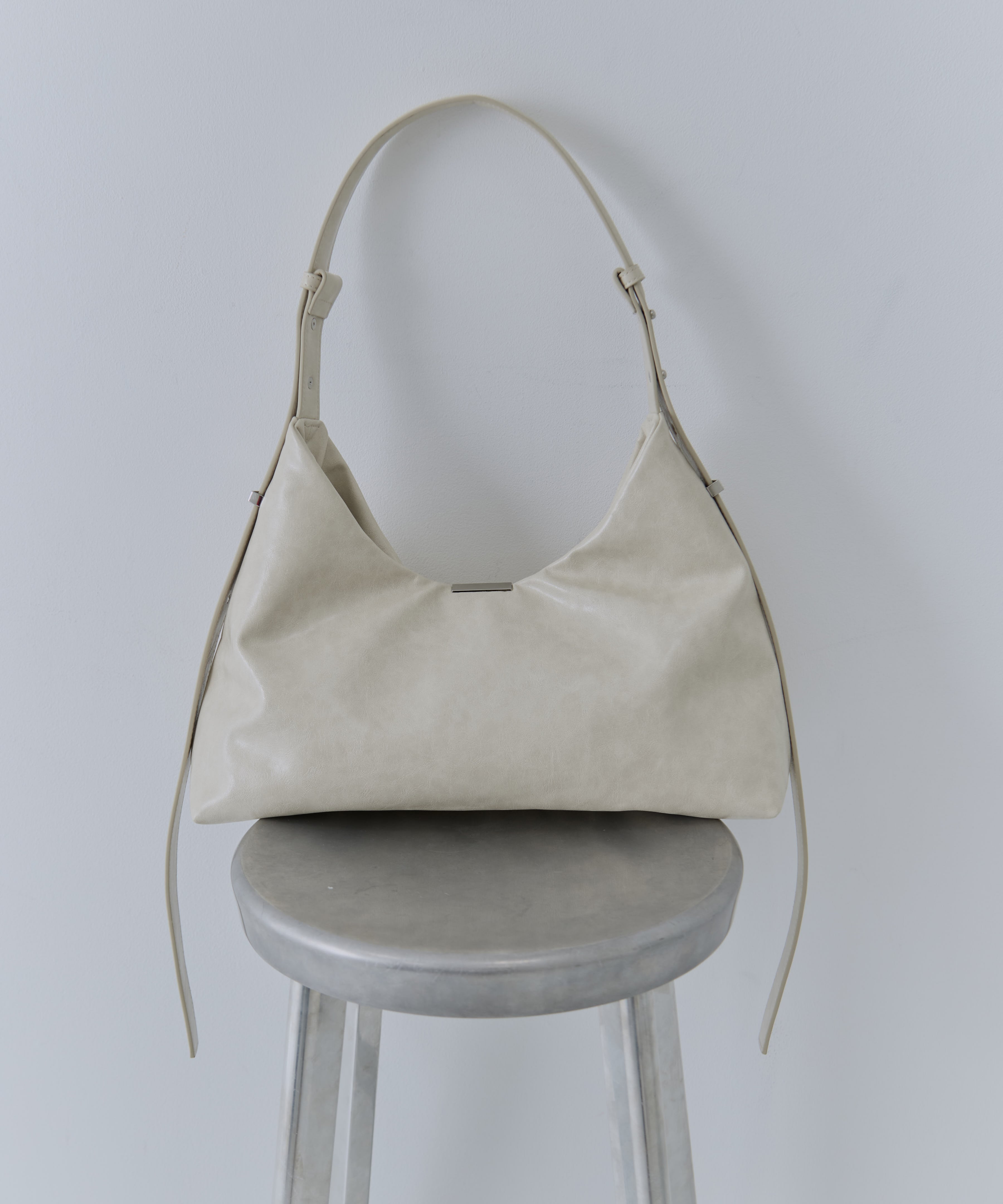 UND PARTS ACCENT ONE HANDLE BAG AMERI