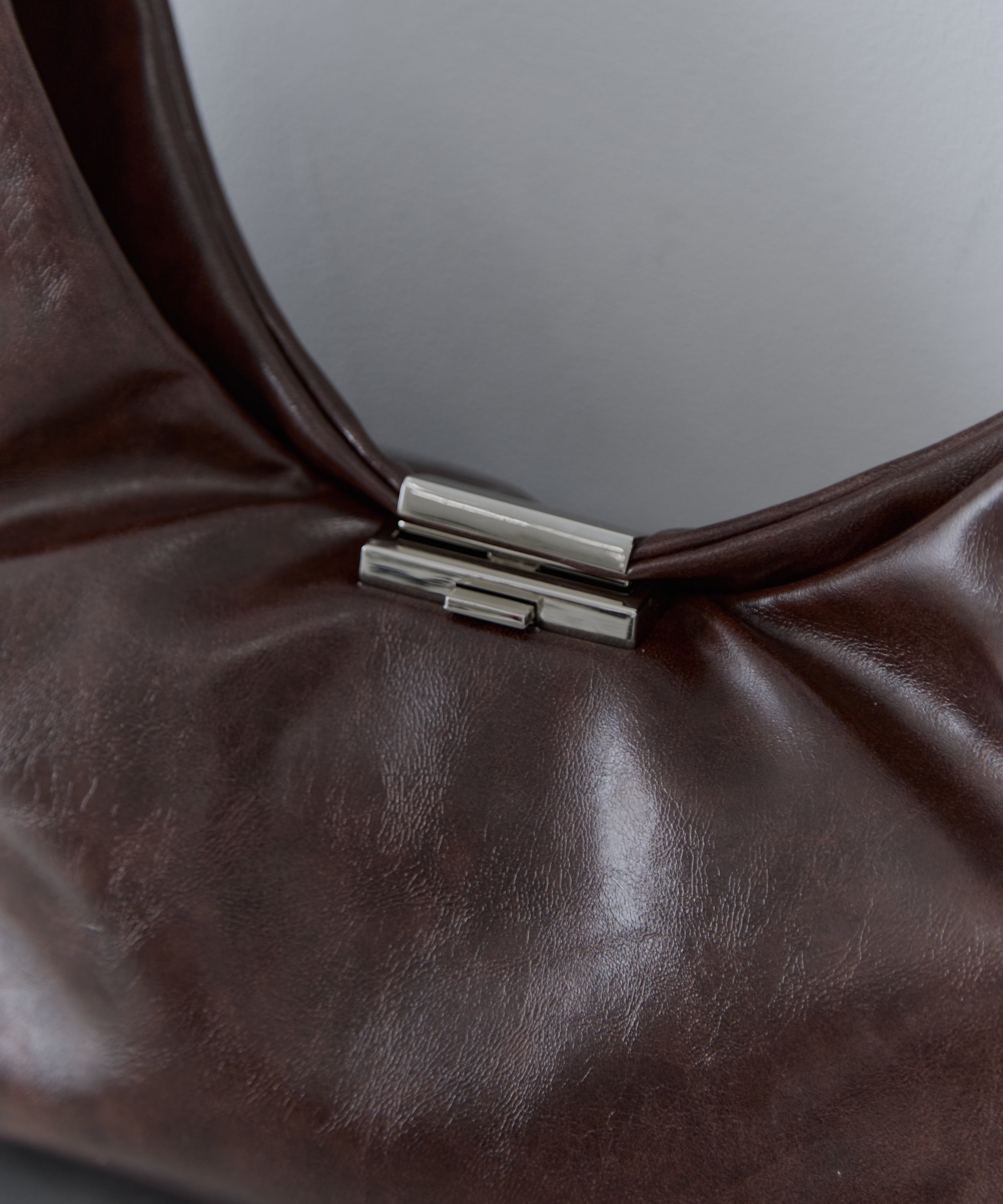 UND PARTS ACCENT ONE HANDLE BAG AMERI