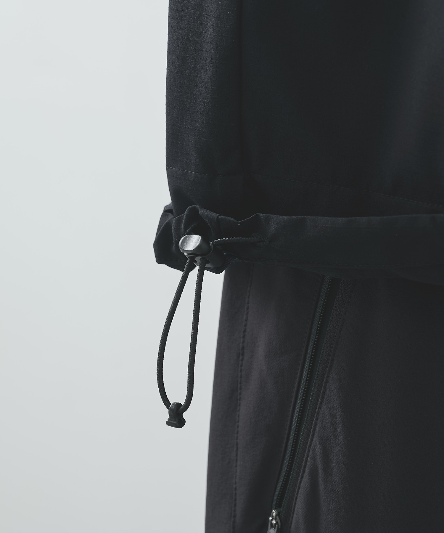 THE DEFORMED S/S PULLOVER WITH UTILITY POCKETS POLIQUANT