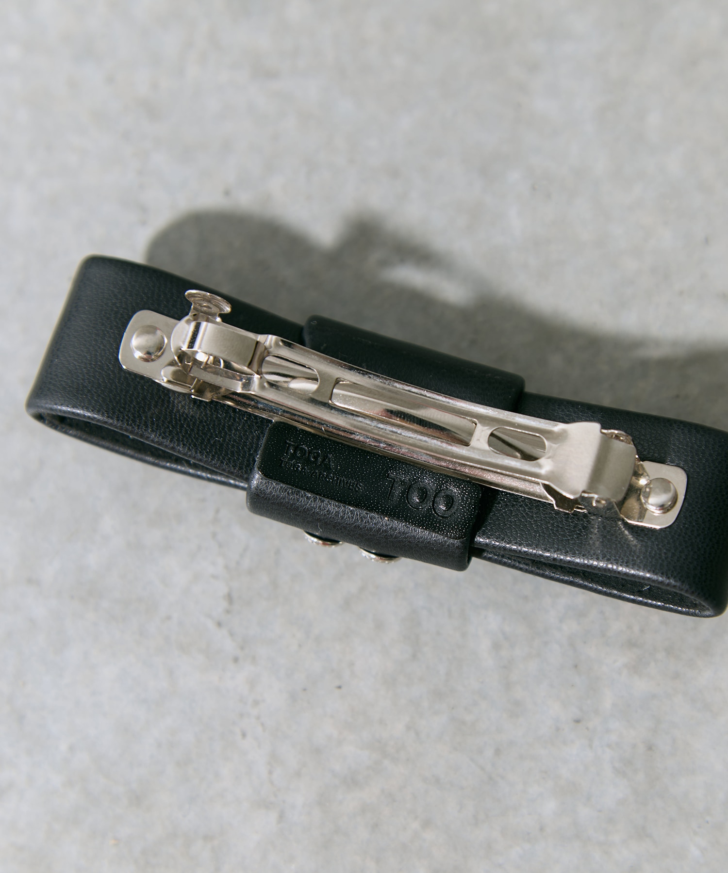 Concho leather barrette TOGA