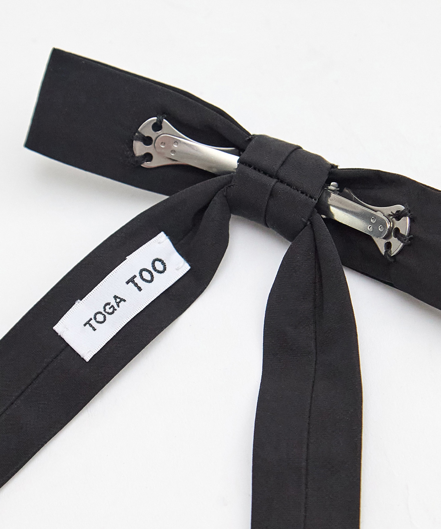 Metal ribbon clip tie TOGA