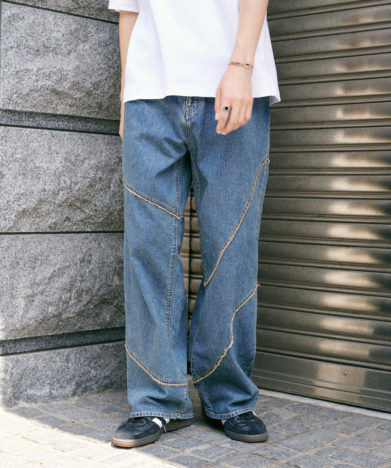 DISTORTED DENIM PANTS