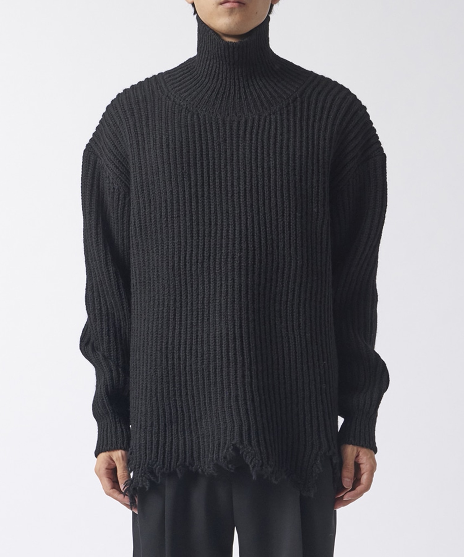 Wool broken knit high neck sweater