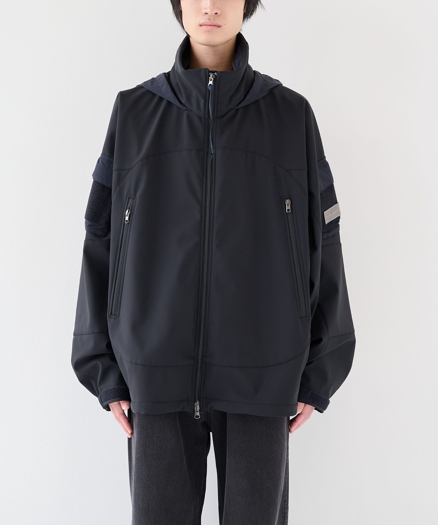 THE PROTECTED COMMON UNIFORM HOODED FLEECE BONDING JACKET