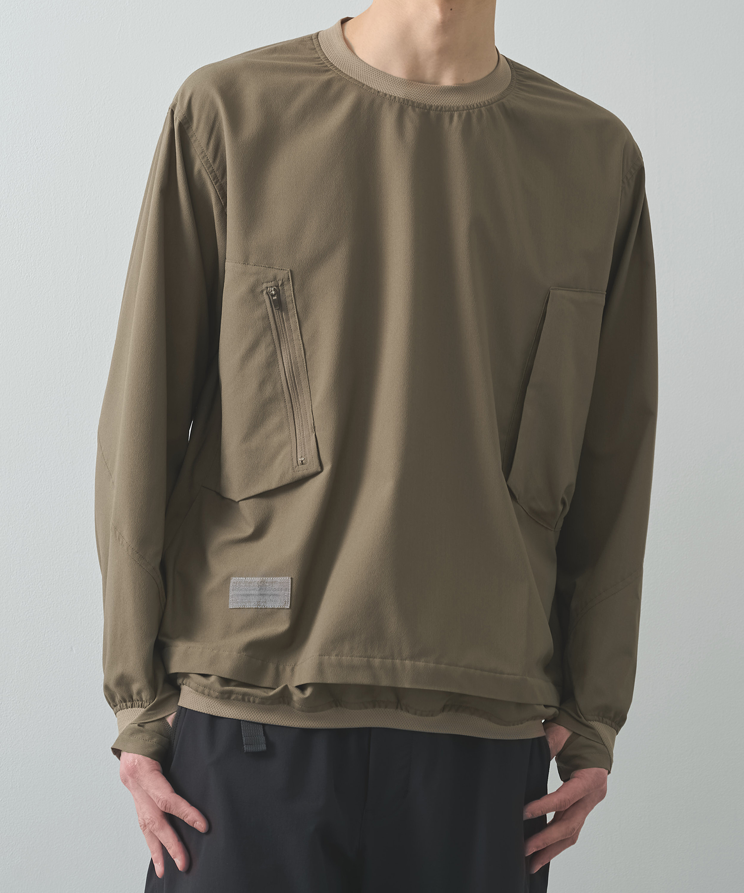 THE DEFORMED L/S PULLOVER WITH UTILITY POCKETS